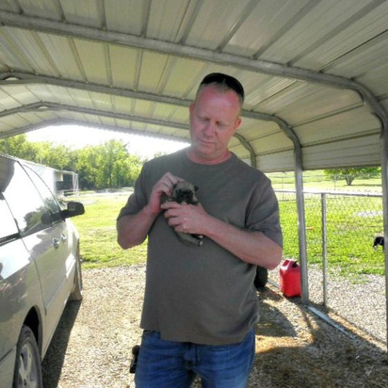 Frank Mineo Jr. holding puppy