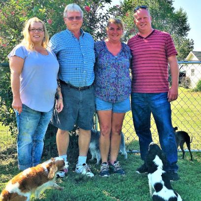 Puppies 'N Love & Animal Kingdom owner Frank Mineo Jr. and Animal Health Director Michelle L. wiith Stacy and her husband on 2016 breeder trip