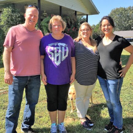 Puppies 'N Love & Animal Kingdom owner Frank Mineo Jr., Animal Health Director Michelle L. and store owner Loni T. with Susie on 2016 breeder trip to Missouri