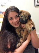 woman with a soft coated wheaton terrier