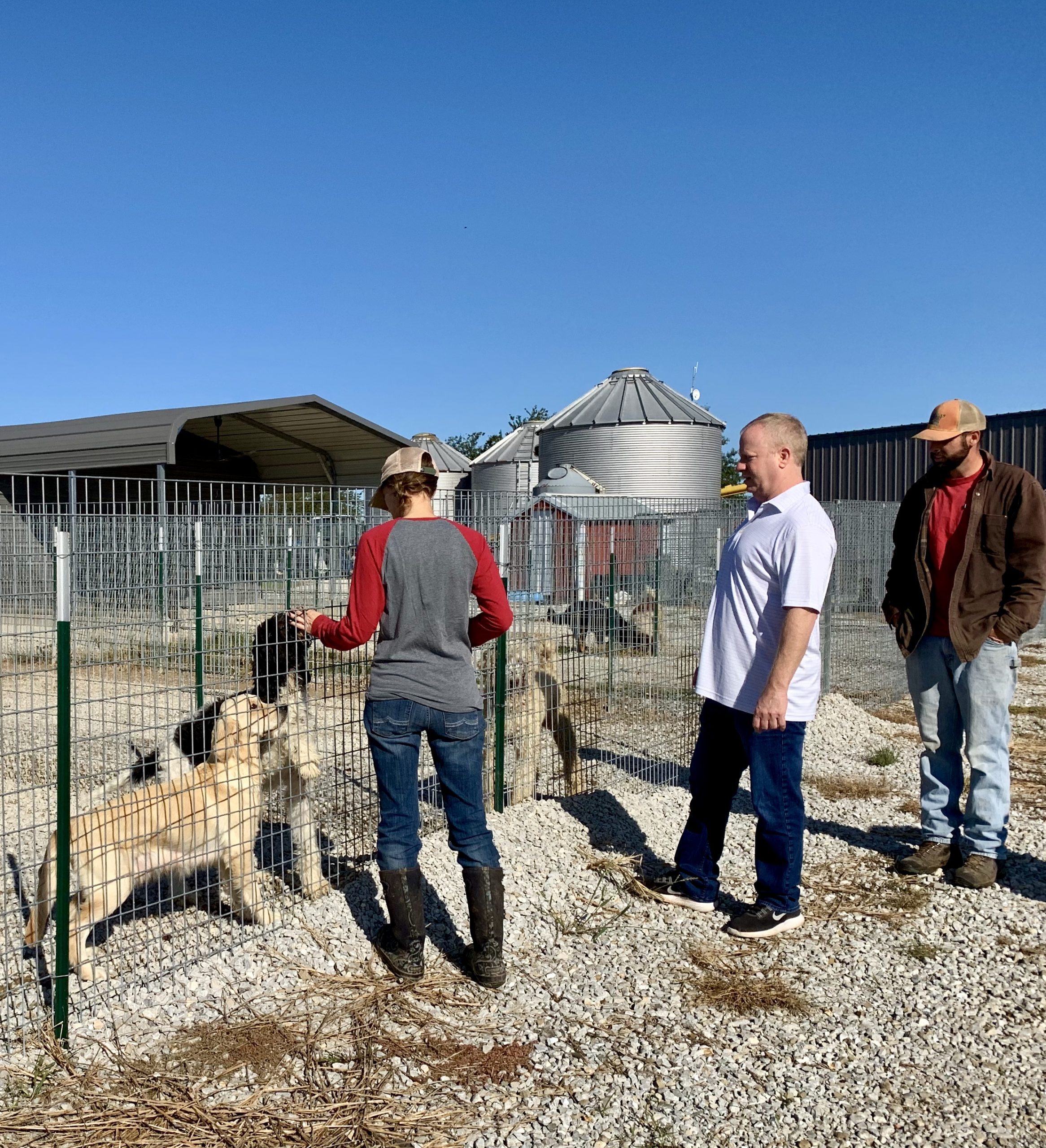 Frank Mineo Jr inspecting Megan's kennel