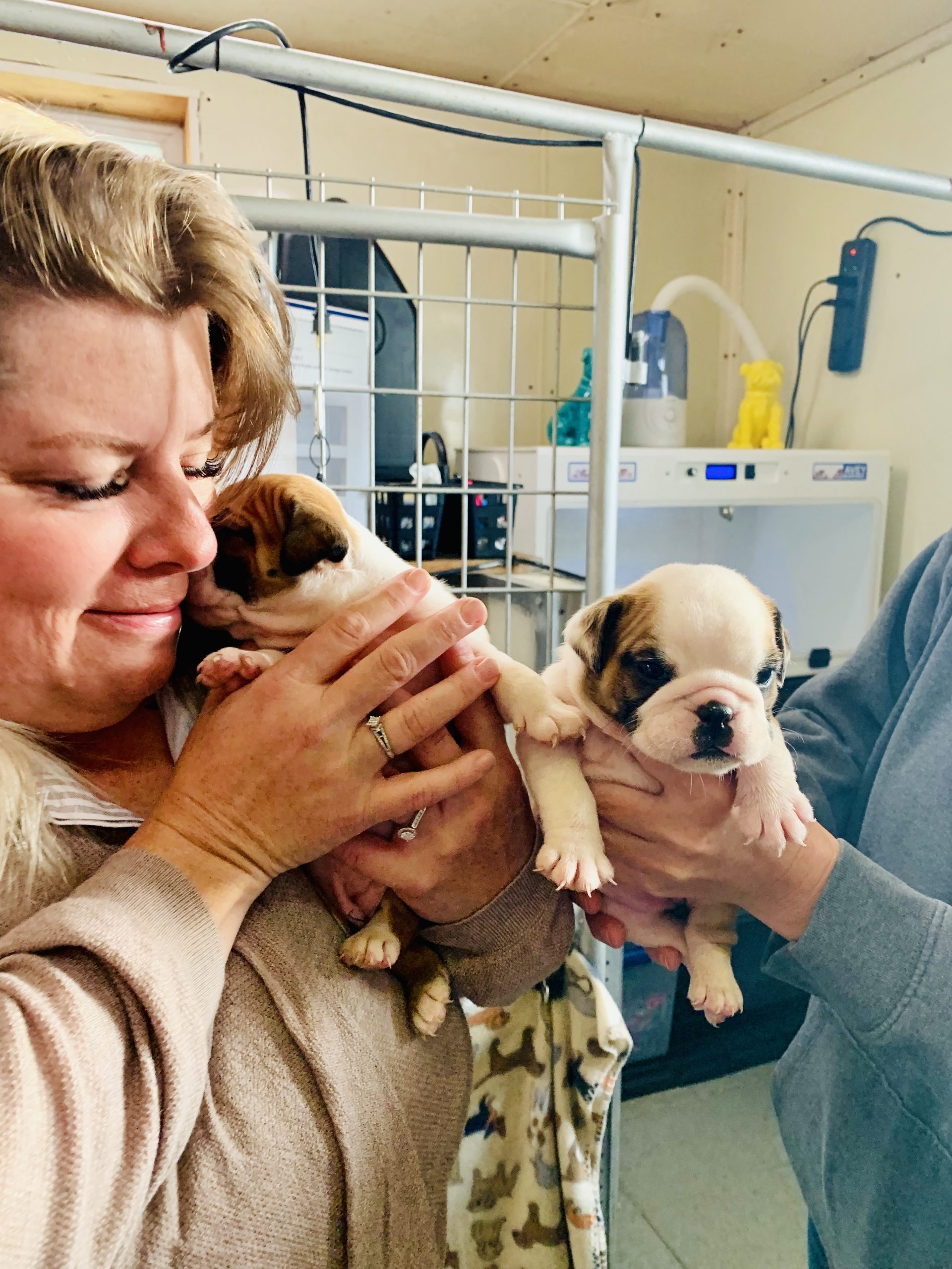 CPI employee with one fo Kim's puppies