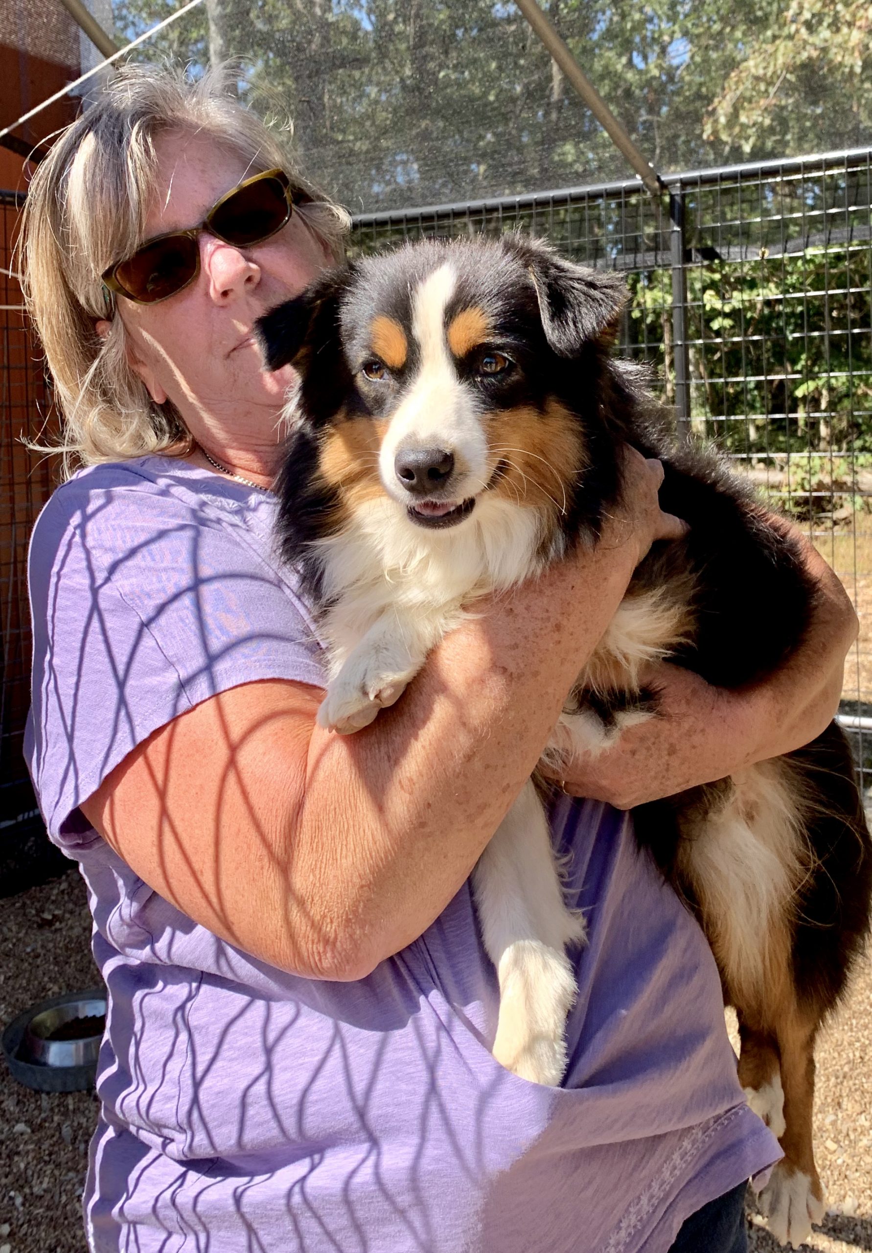 Nancy with one of her adult dogs