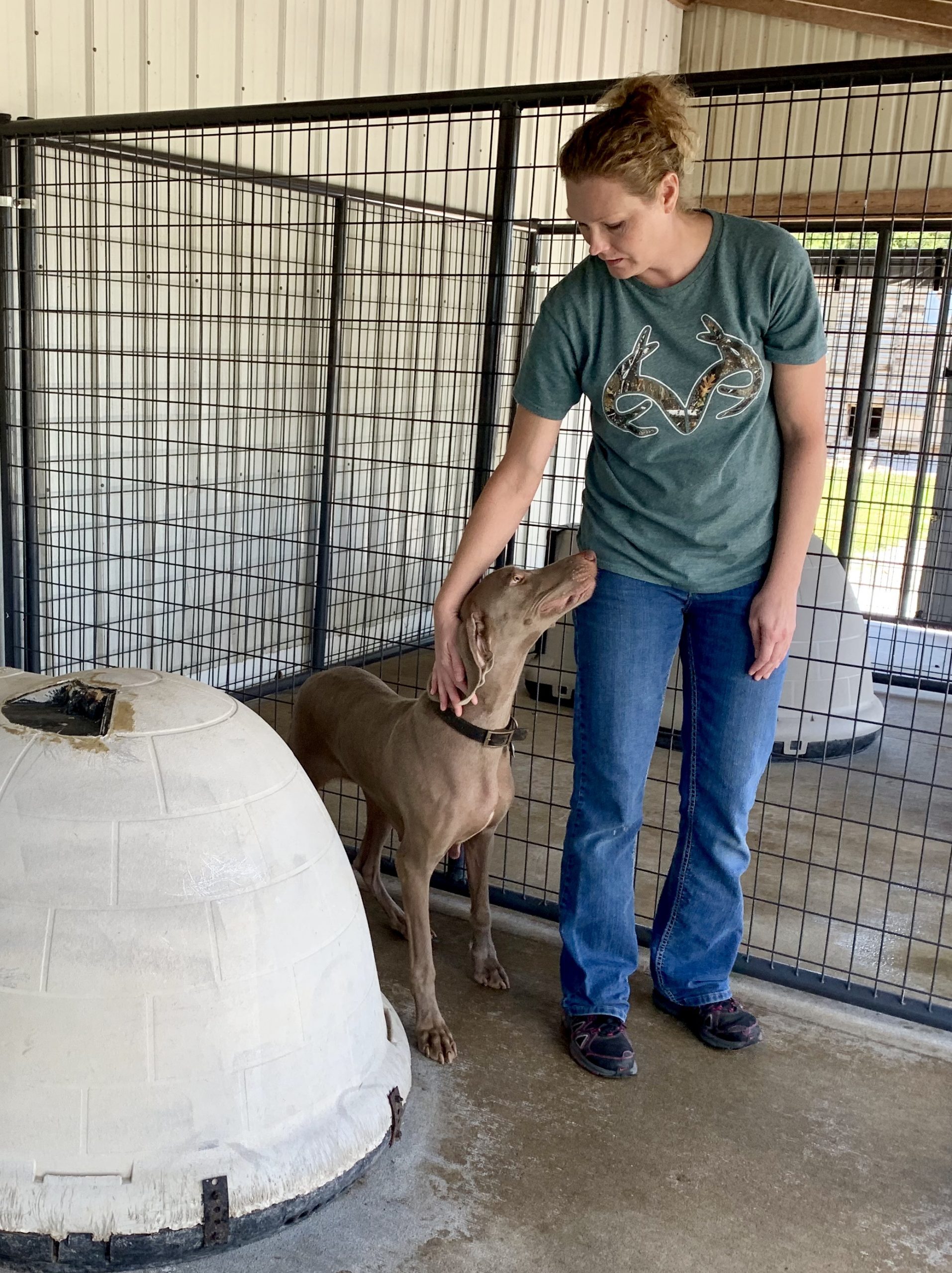 Cindy with one of her adult dogs