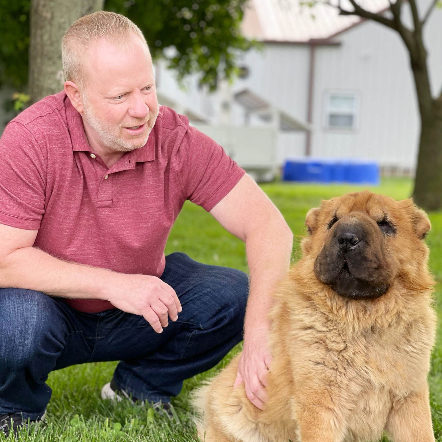 Our CEO, Frank Mineo, petting a shar pei